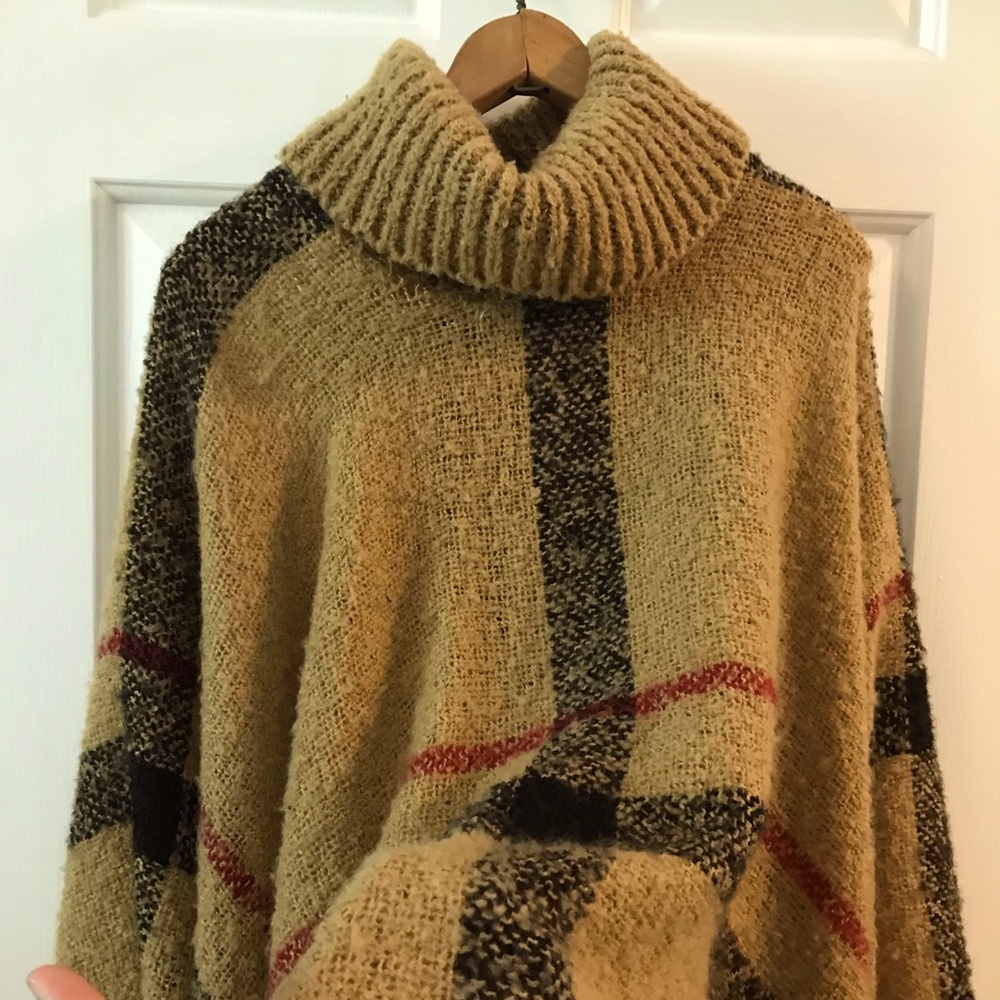 What: Poncho. Brand: B. Boutique by Evergreen. Color: Beige, red & black.
